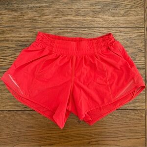 Lululemon Athletica Carnation Red Hotty Hot- Shorts Size 4, low rise, 4” inseam